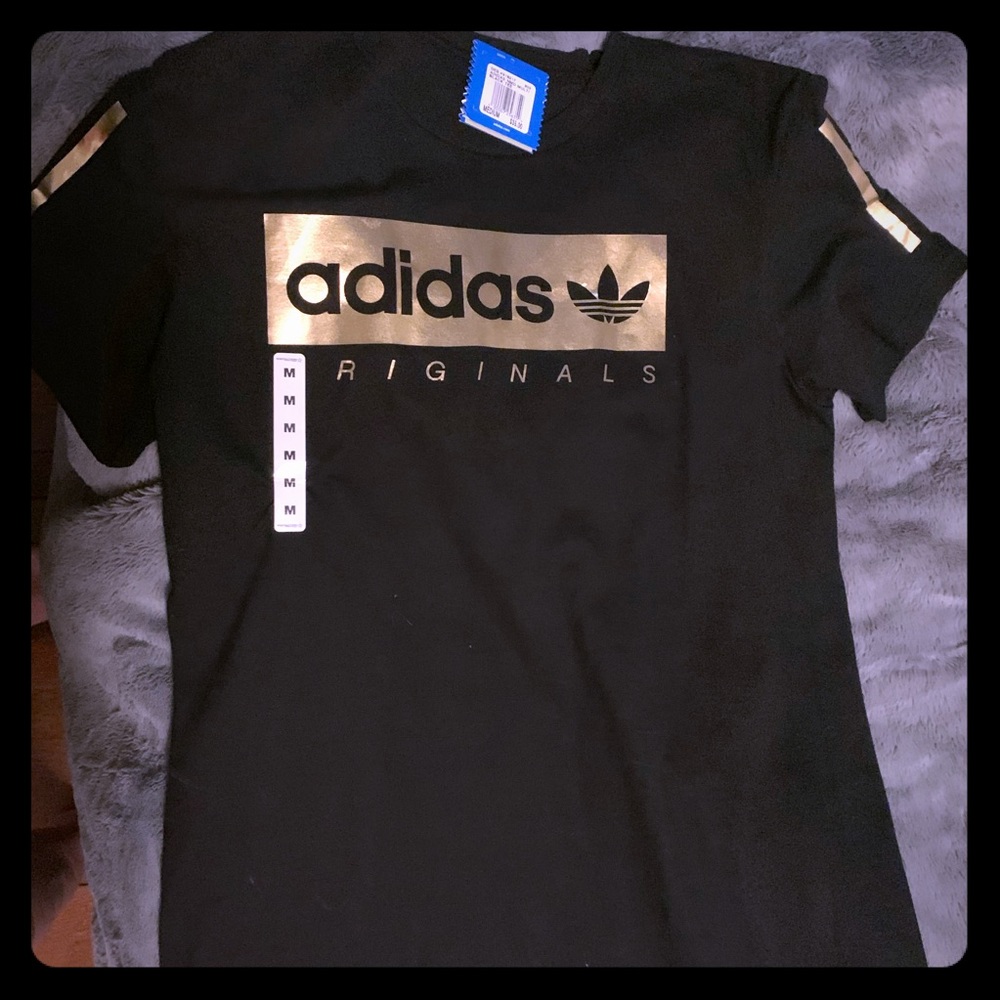 Adidas gold and black t-shirt